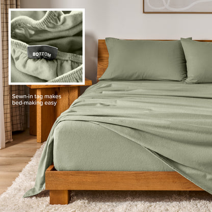 Flannel sheets on a with an inset of a sewn-in tag reading BOTTOM