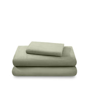 Cotton flannel sheet set folded and stacked on a white background