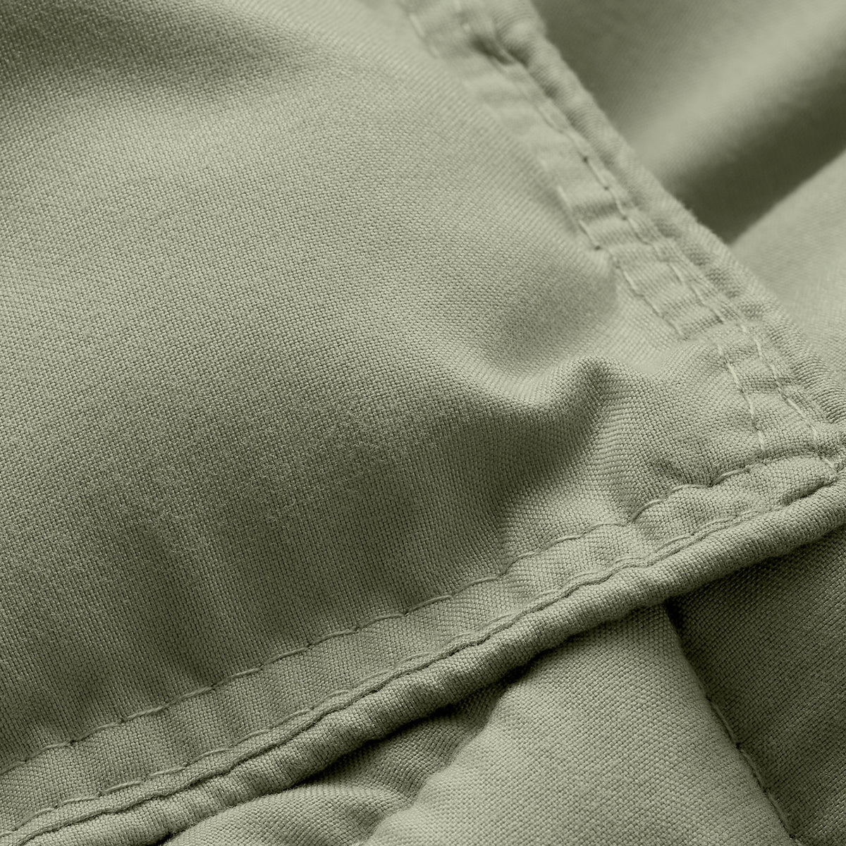Close-up of comforter fabric with stitching detail