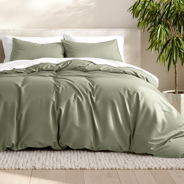 Microfiber bedding set on a bed with a neutral background