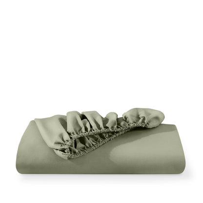 Microfiber fitted sheet folded with a white background