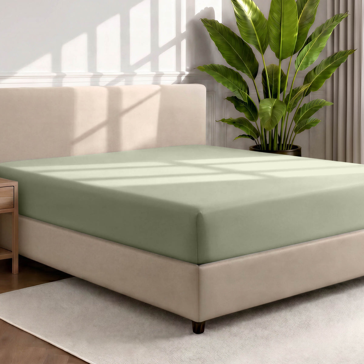 Ultra soft fitted sheet on a mattress with the sun shining into the bedroom