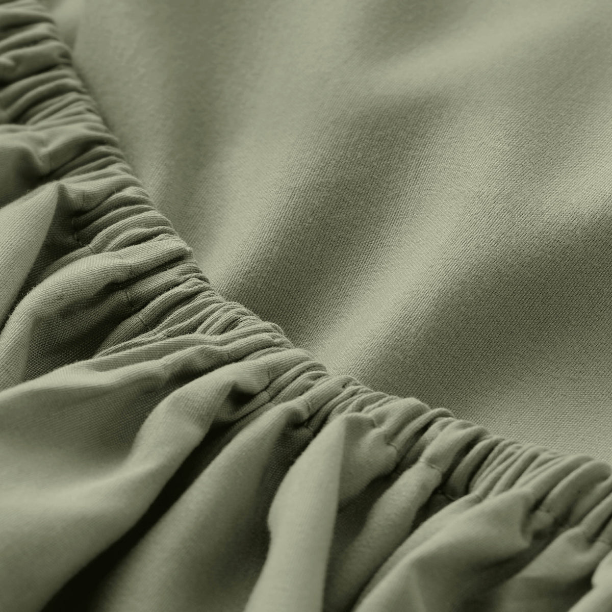 Close-up of fitted sheet with all around elastic