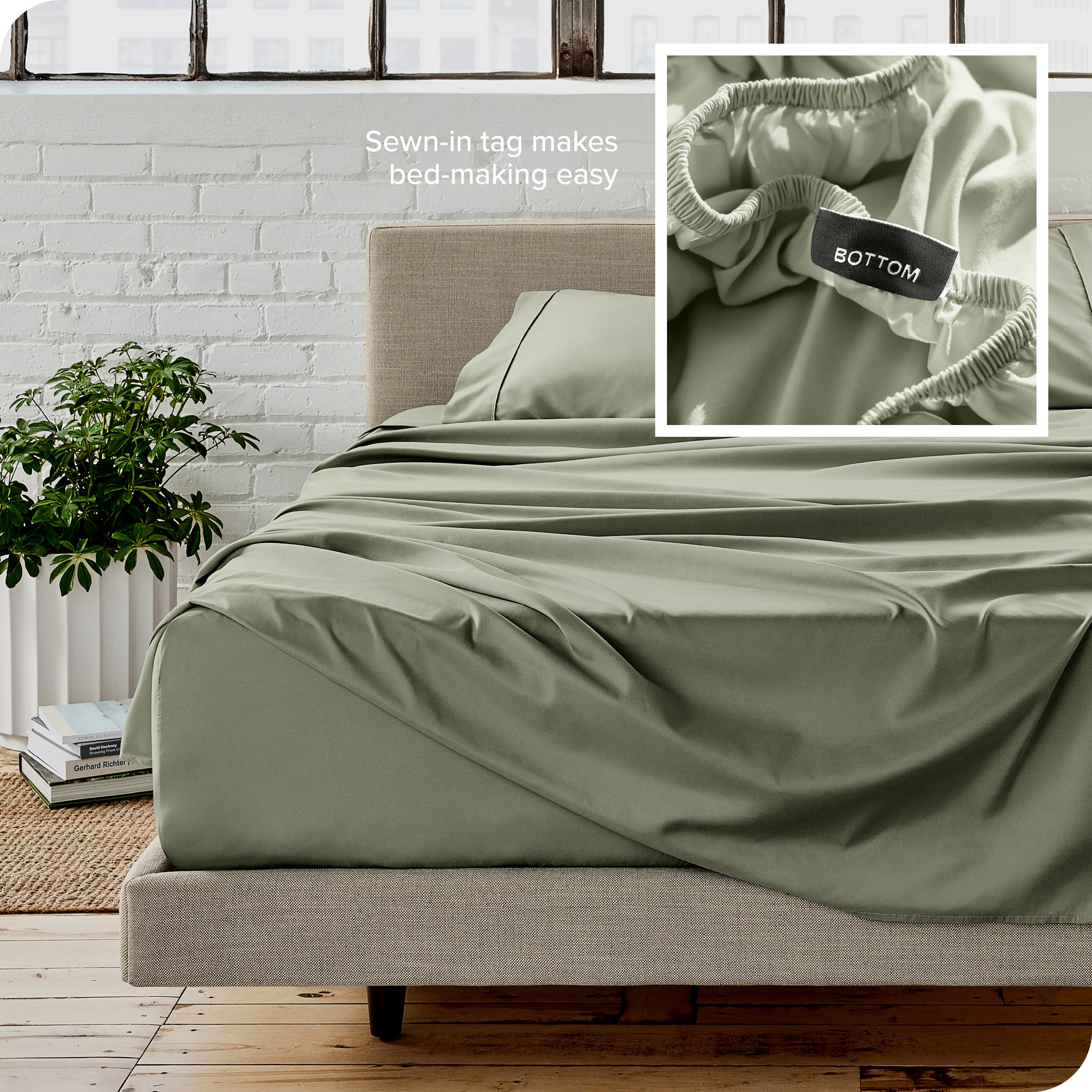 Close up of sewn in tag and matching sheets on a bed