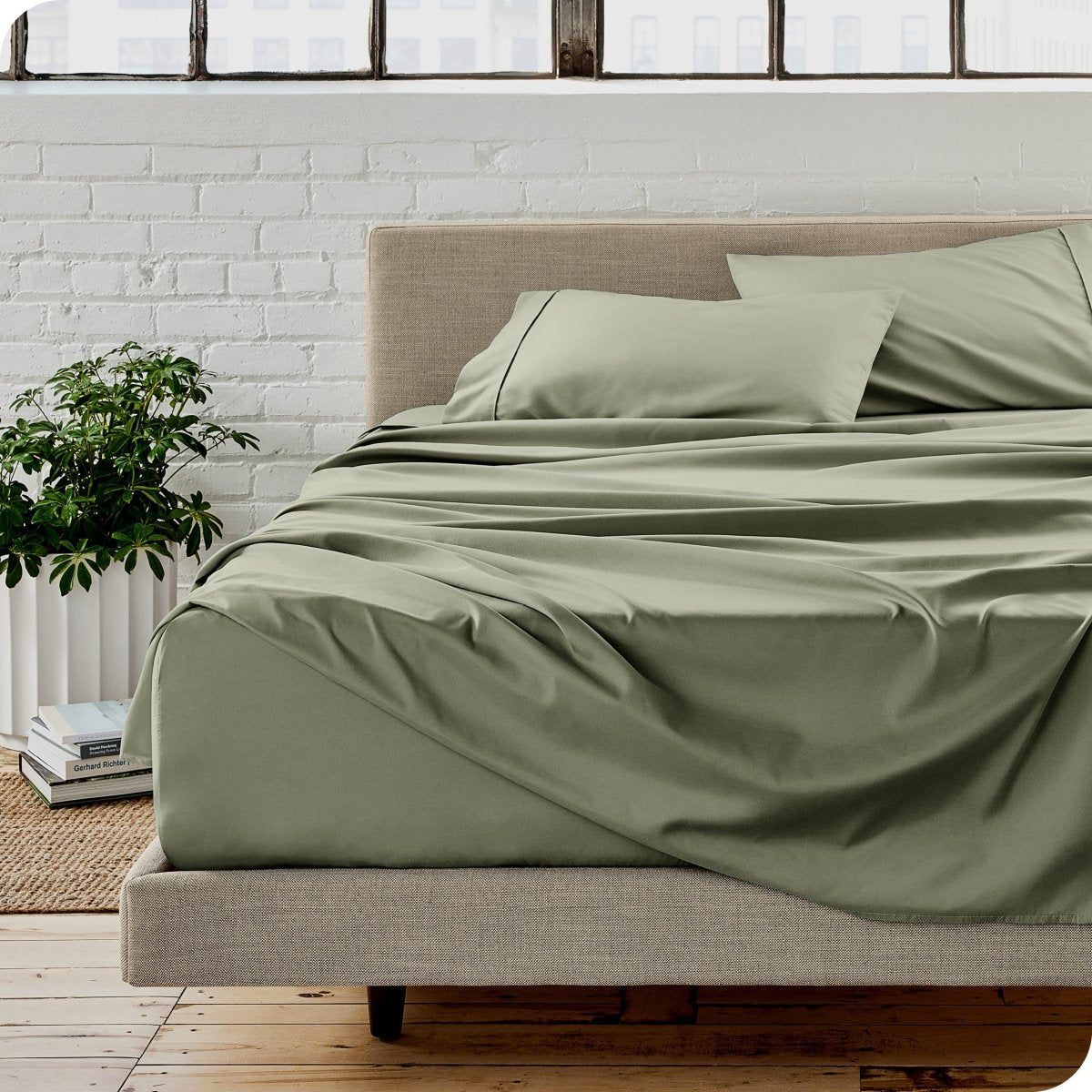 A modern bedroom with microfiber sheets on the mattress