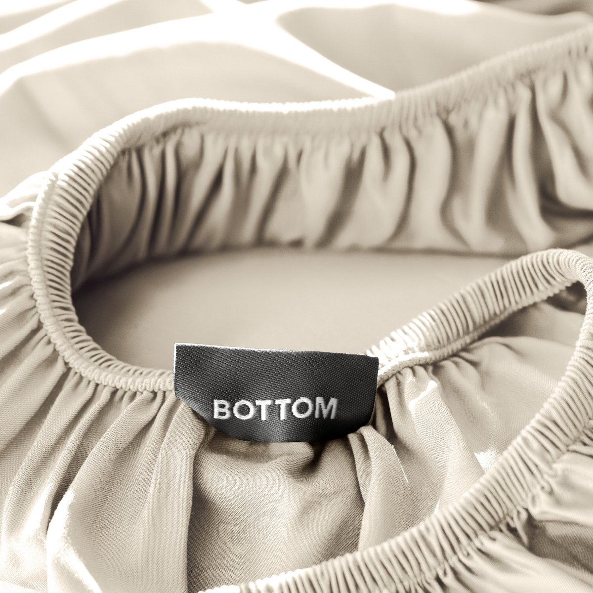 Close up of the tag on the fitted bamboo sheet.
