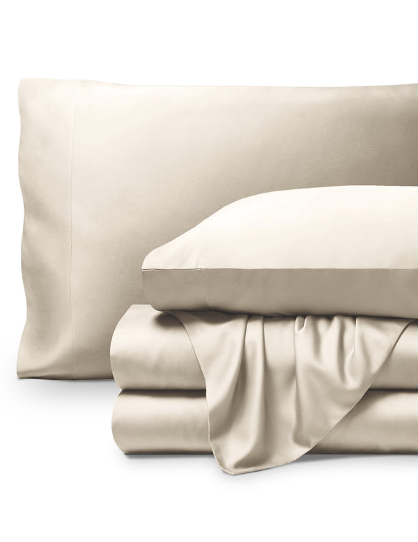 Bamboo pillowcases and sheets set on a white background