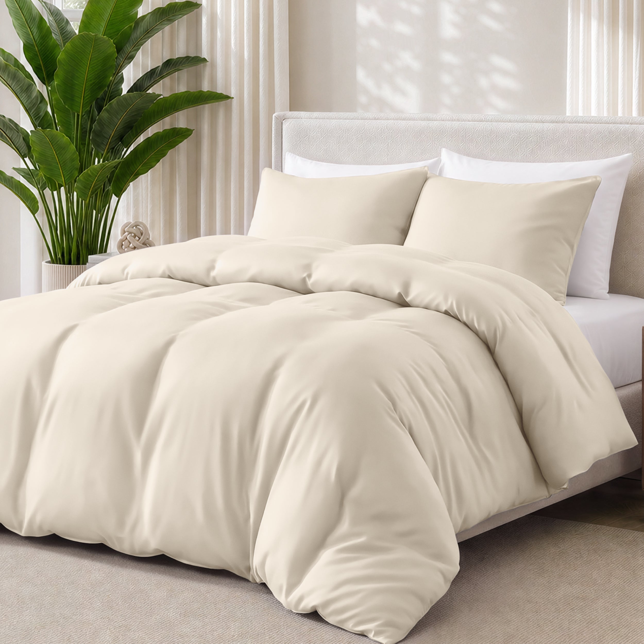 Sand bedding set on a bed with a plant in the background