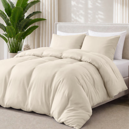 Sand bedding set on a bed with a plant in the background