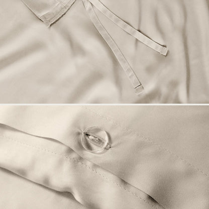 Close-up of the corner ties and button closure on a duvet cover