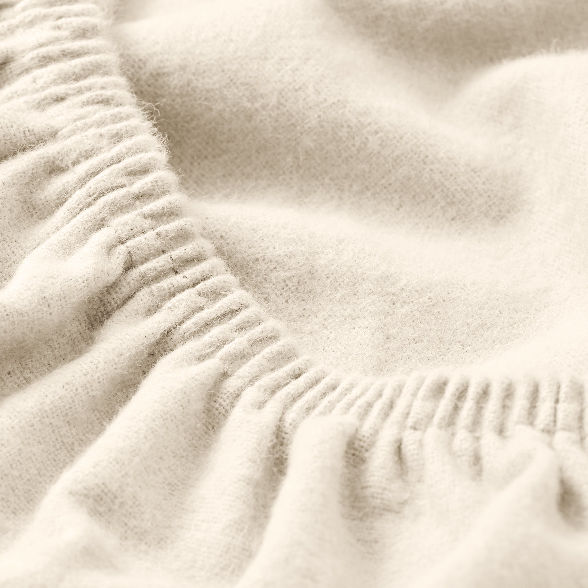 Close up of a flannel fitted sheet.
