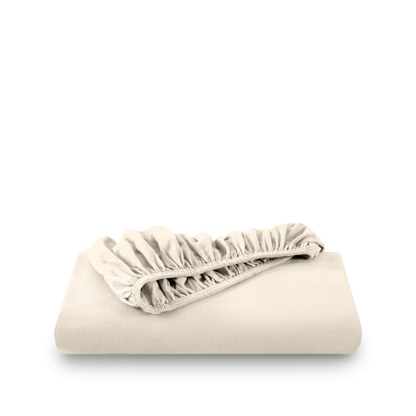 Sand fitted sheet on white background