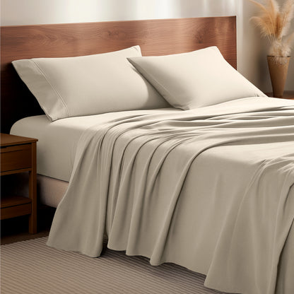 Flannel bedding set on a bed with a wooden headboard and side table