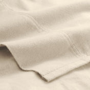 Close-up of flannel fabric with a focus on texture and color.