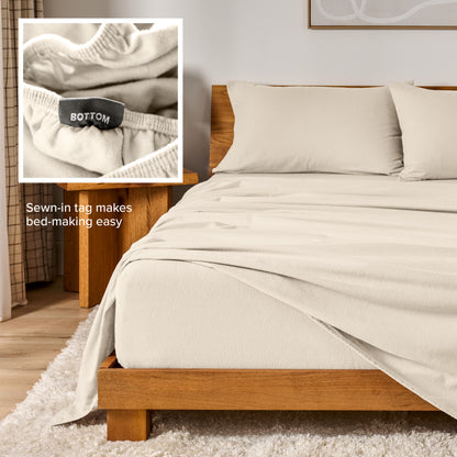 Flannel sheets on a with an inset of a sewn-in tag reading BOTTOM
