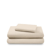 Cotton flannel sheet set folded and stacked on a white background