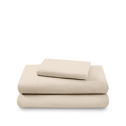 Cotton flannel sheet set folded and stacked on a white background