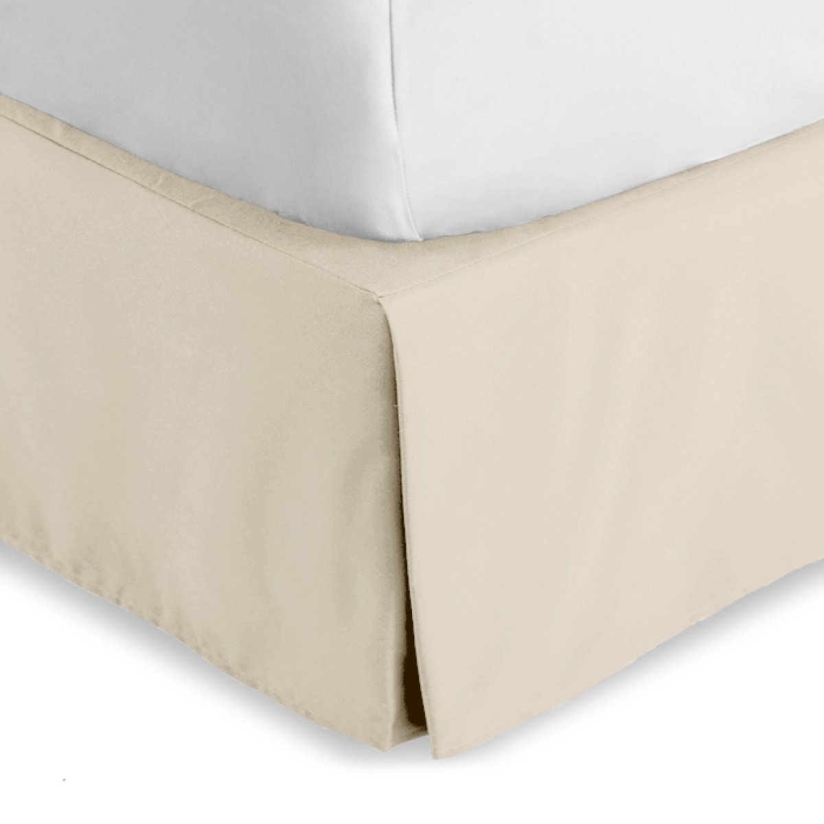 Bed skirt on a bed with white bedding