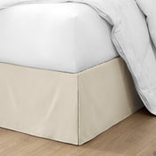 Ultra soft bed skirt on a bed with white bedding.