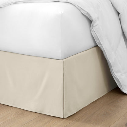 Ultra soft bed skirt on a bed with white bedding.