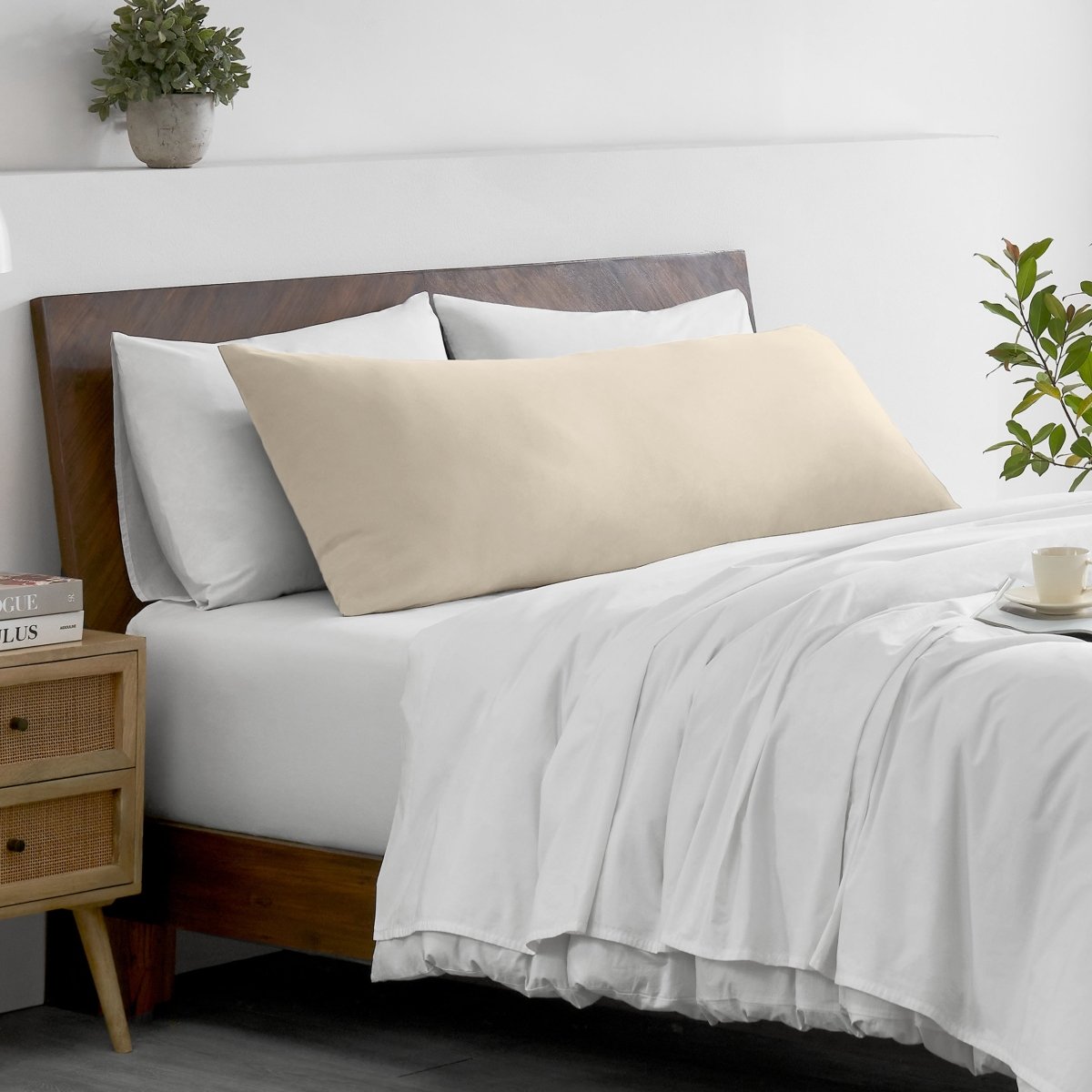 Bed with microfiber bedding and wooden headboard in a bedroom setting