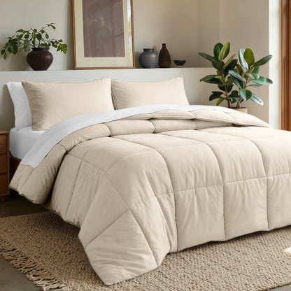 Comforter set on a bed in a bedroom with plants and decor.