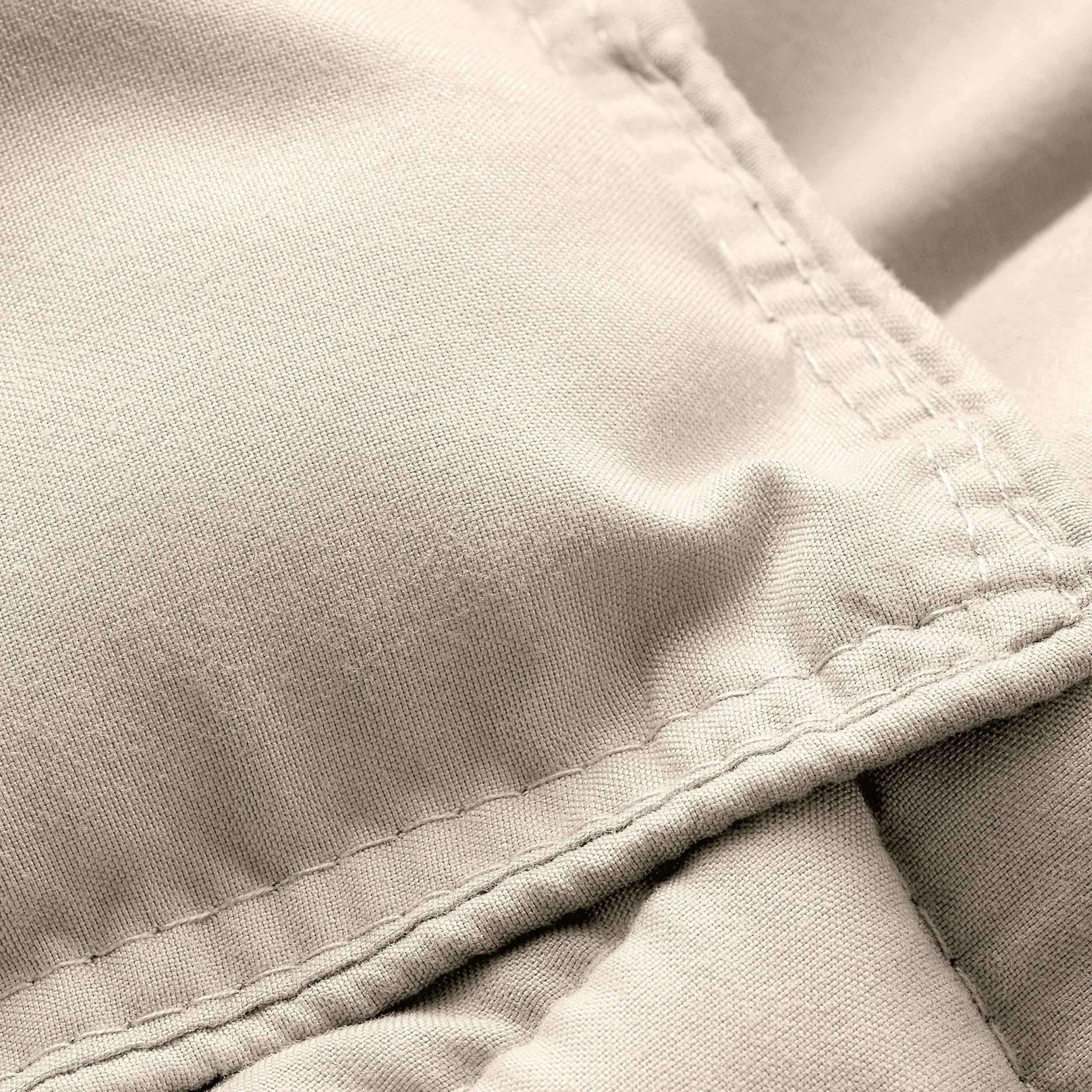 Close-up of comforter fabric with stitching detail