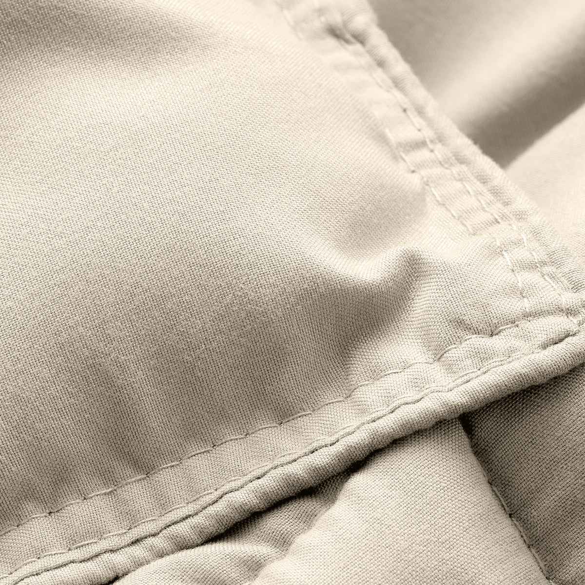 Close-up of comforter fabric with stitching detail