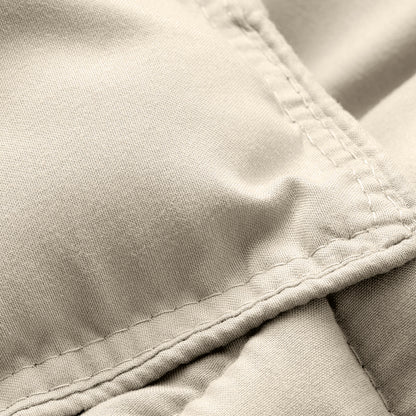Close-up of comforter fabric with stitching detail