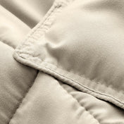 Close-up of comforter fabric with stitching detail