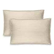 Two microfiber pillow shams on a white background