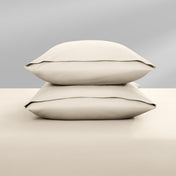 Two pillowcases on top of a bed