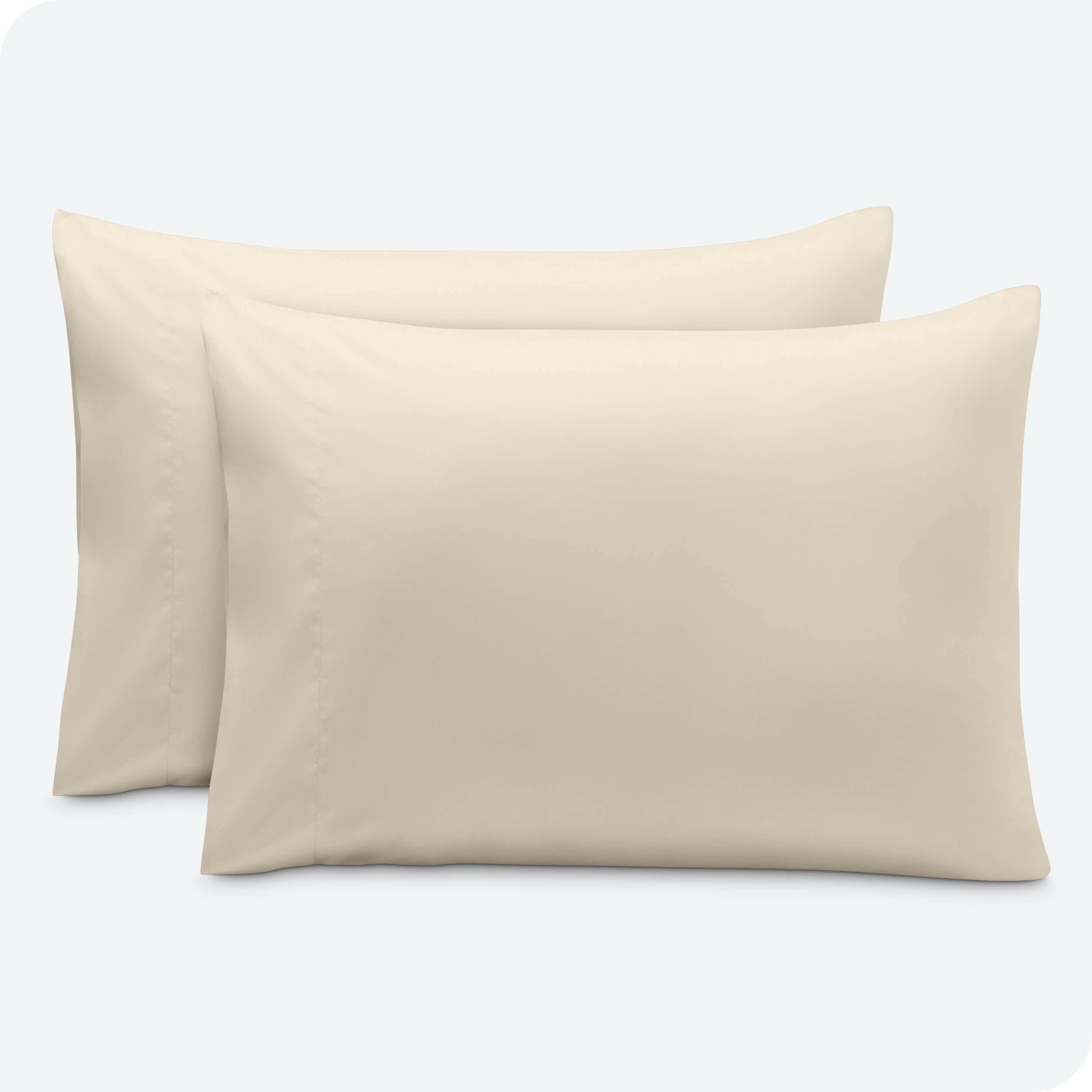 2 pillowcases on pillows