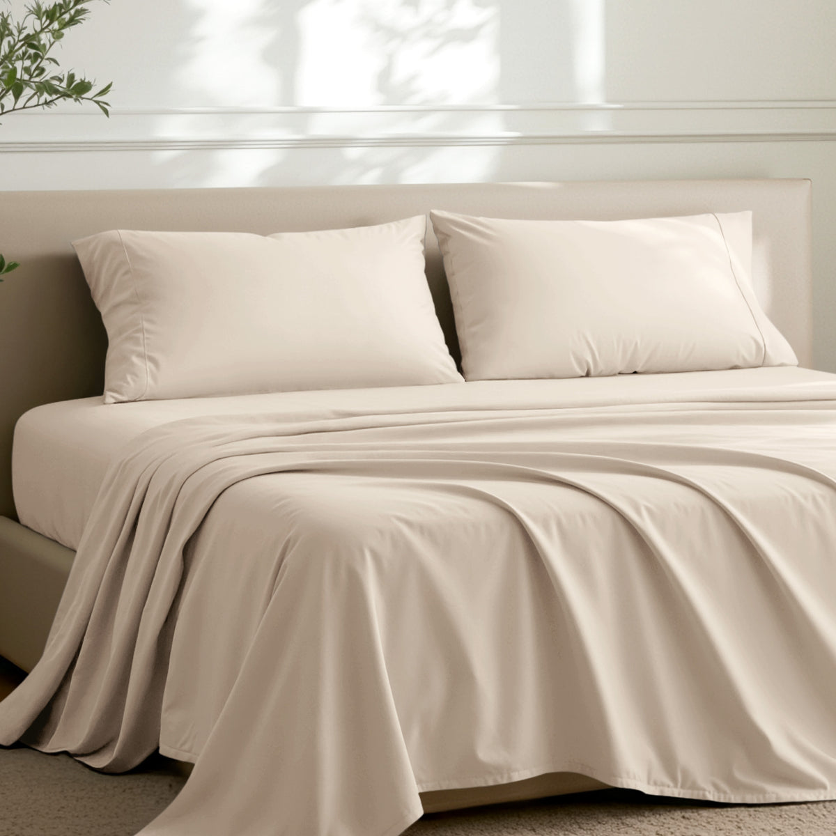 2 pillowcases on pillows on a nicely made bed