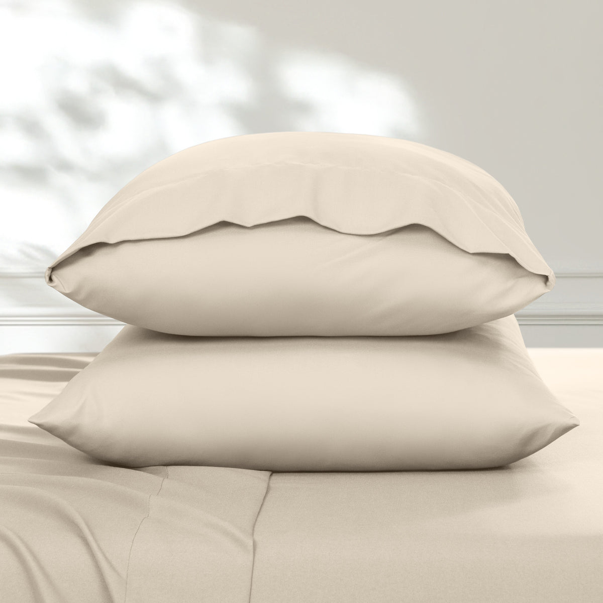 2 pillowcases on pillows