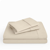 Microfiber sheet set folded and stacked neatly.