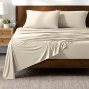 Bed sheets on a wooden bed in a bedroom setting