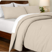 An angled view of a comforter set on a bed