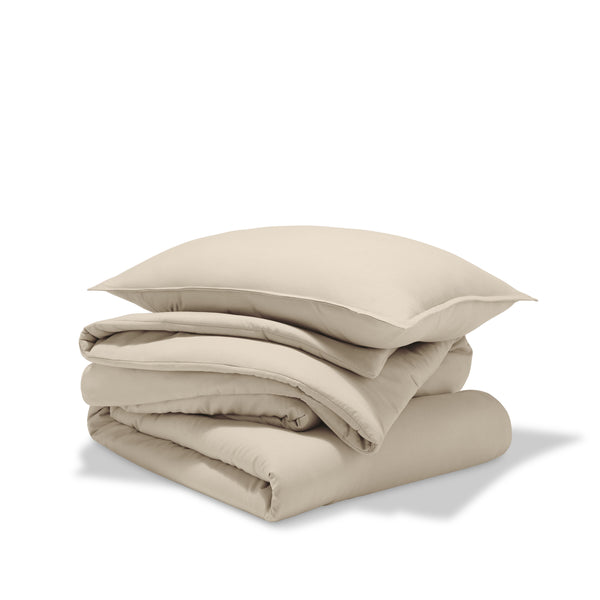 A comforter set folded and stacked