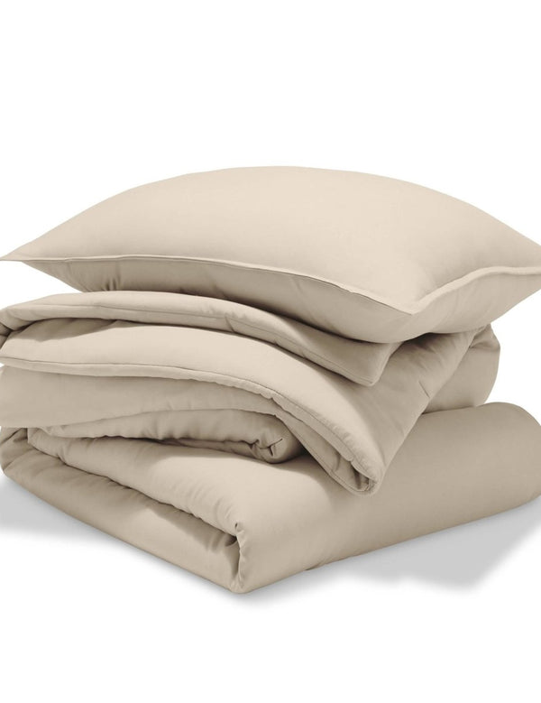 A comforter set folded and stacked