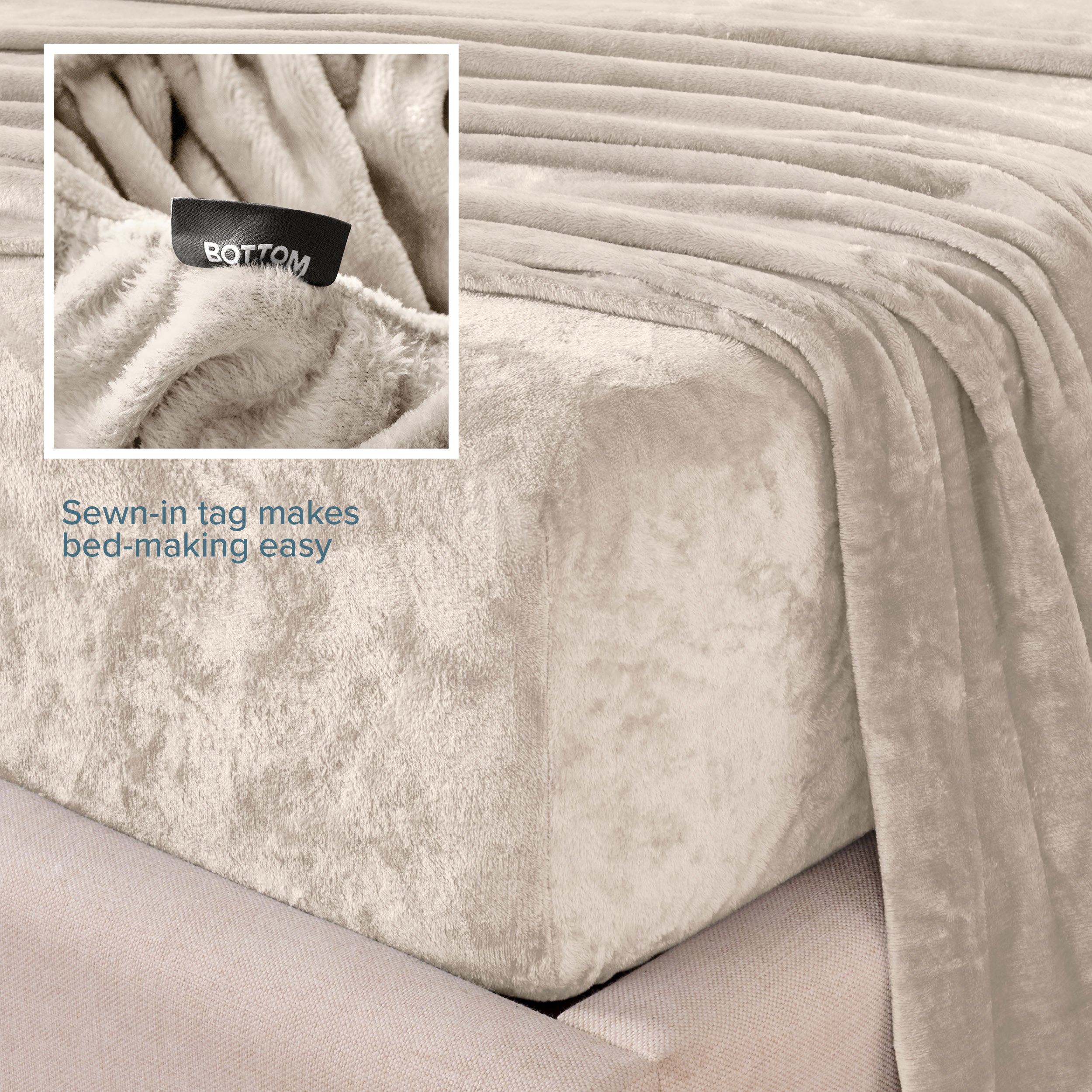Close-up of the corner of a bed made with microplush sheets