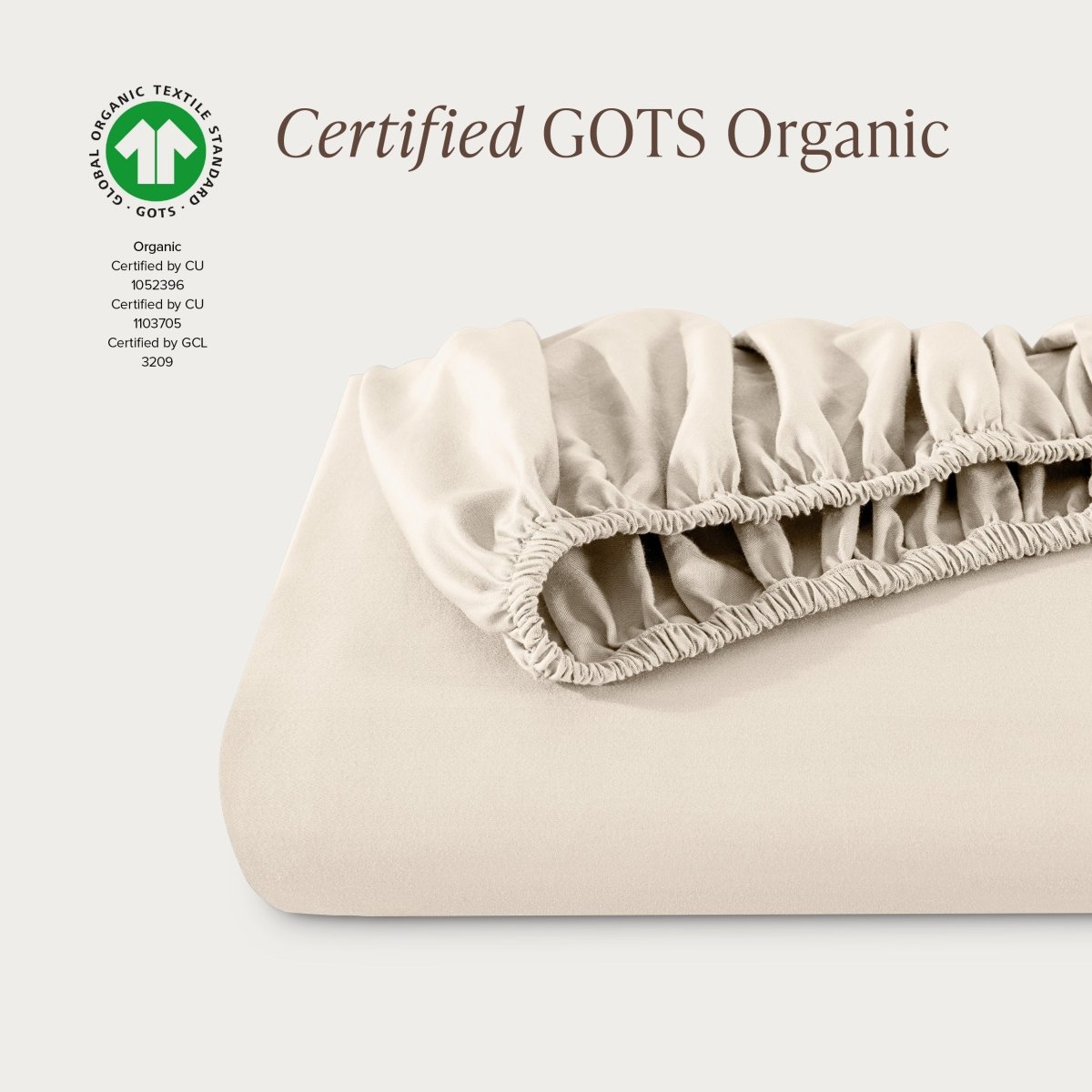 Certified GOTS Organic fitted sheet on a light gray background