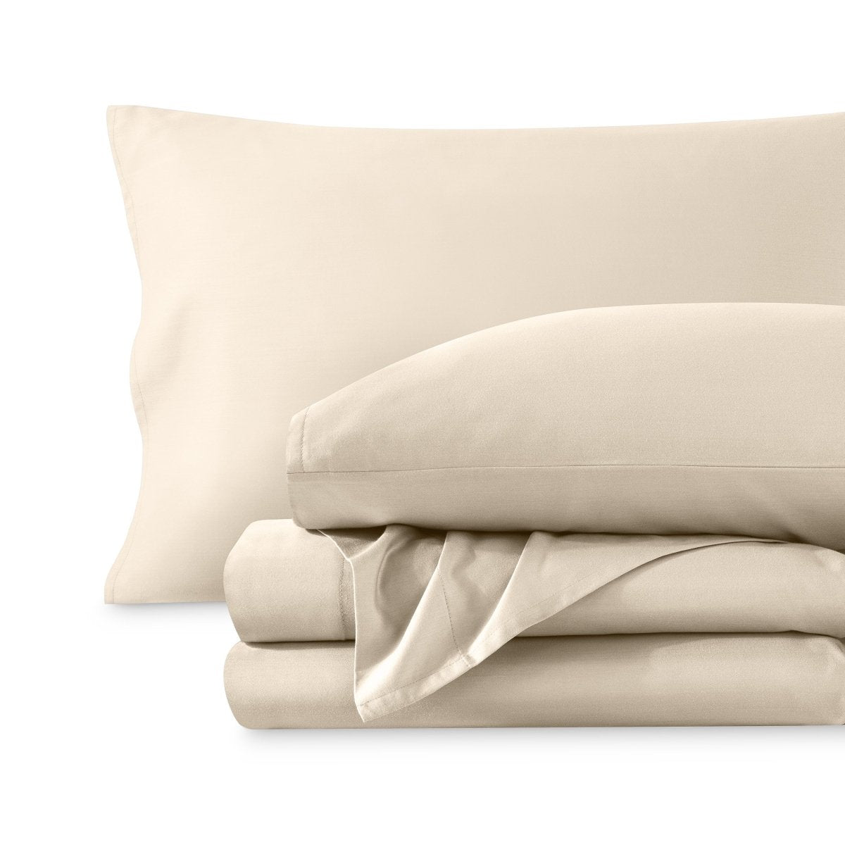 A sateen sheet set folded and stacked on a white background.