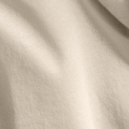 Close-up of organic cotton jersey fabric with subtle texture
