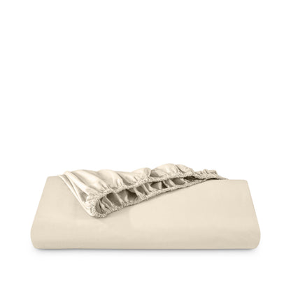 Percale fitted sheet on a white background