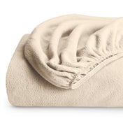 A polar fleece fitted sheet folded