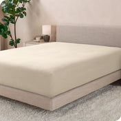 A single fleece fitted sheet on a bed