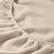 Close up of the elastic portion of a fleece fitted sheet