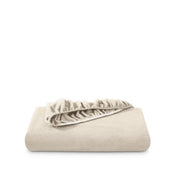 Polar fleece fitted sheet folded on a white background