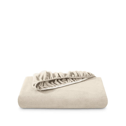 Polar fleece fitted sheet folded on a white background